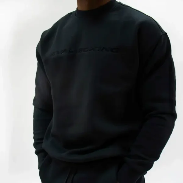 Woman wearing Rival Fleece Oversized Crewneck Sweater in a casual setting