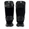 Child's Fairtex SPK9 shin guards on white background