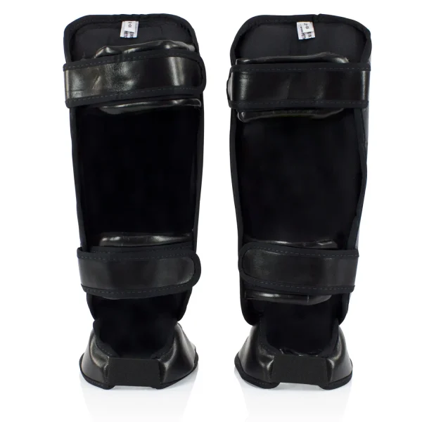 Child's Fairtex SPK9 shin guards on white background