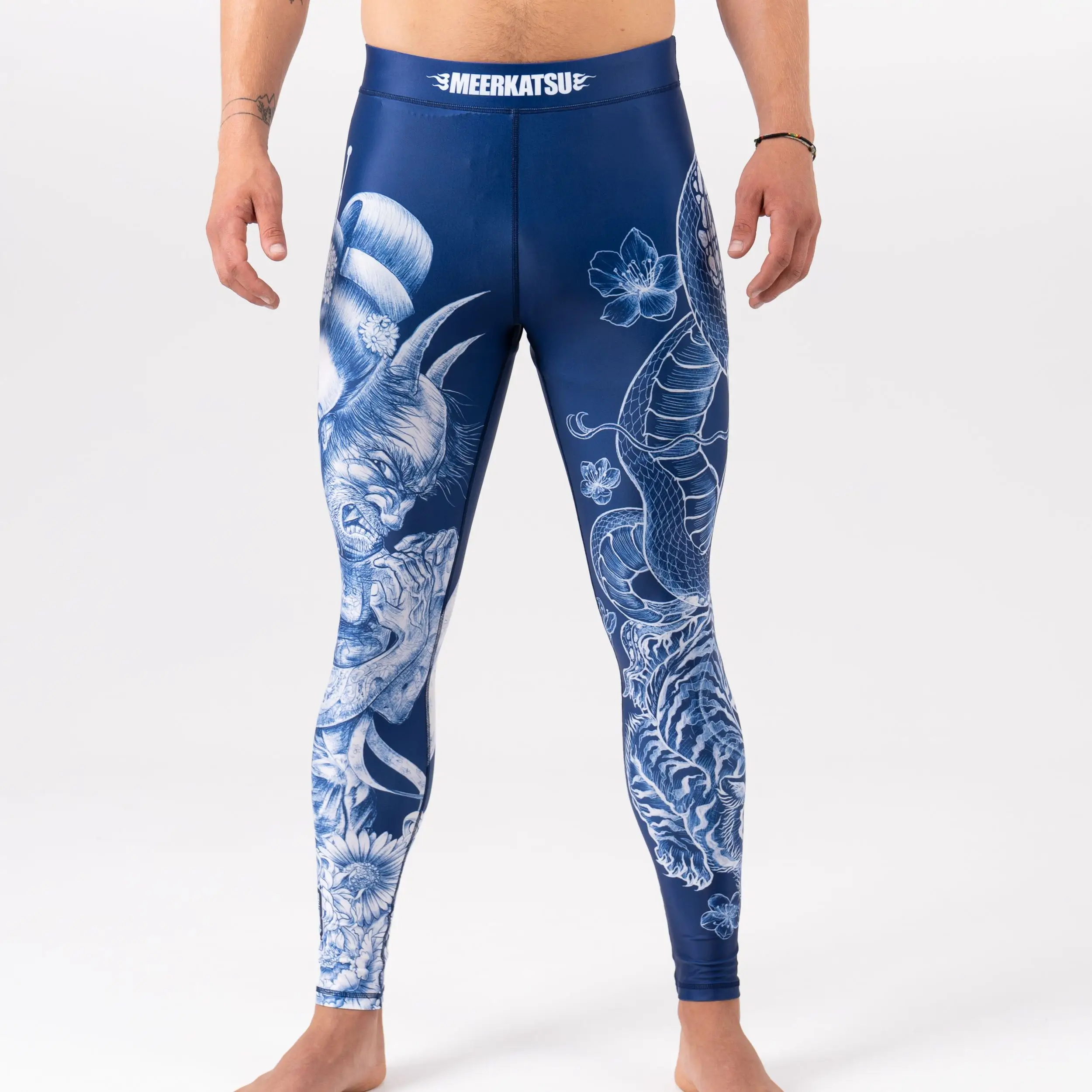 Man wearing Meerkatsu Heavenly Mata Leao Grappling Tights Spats