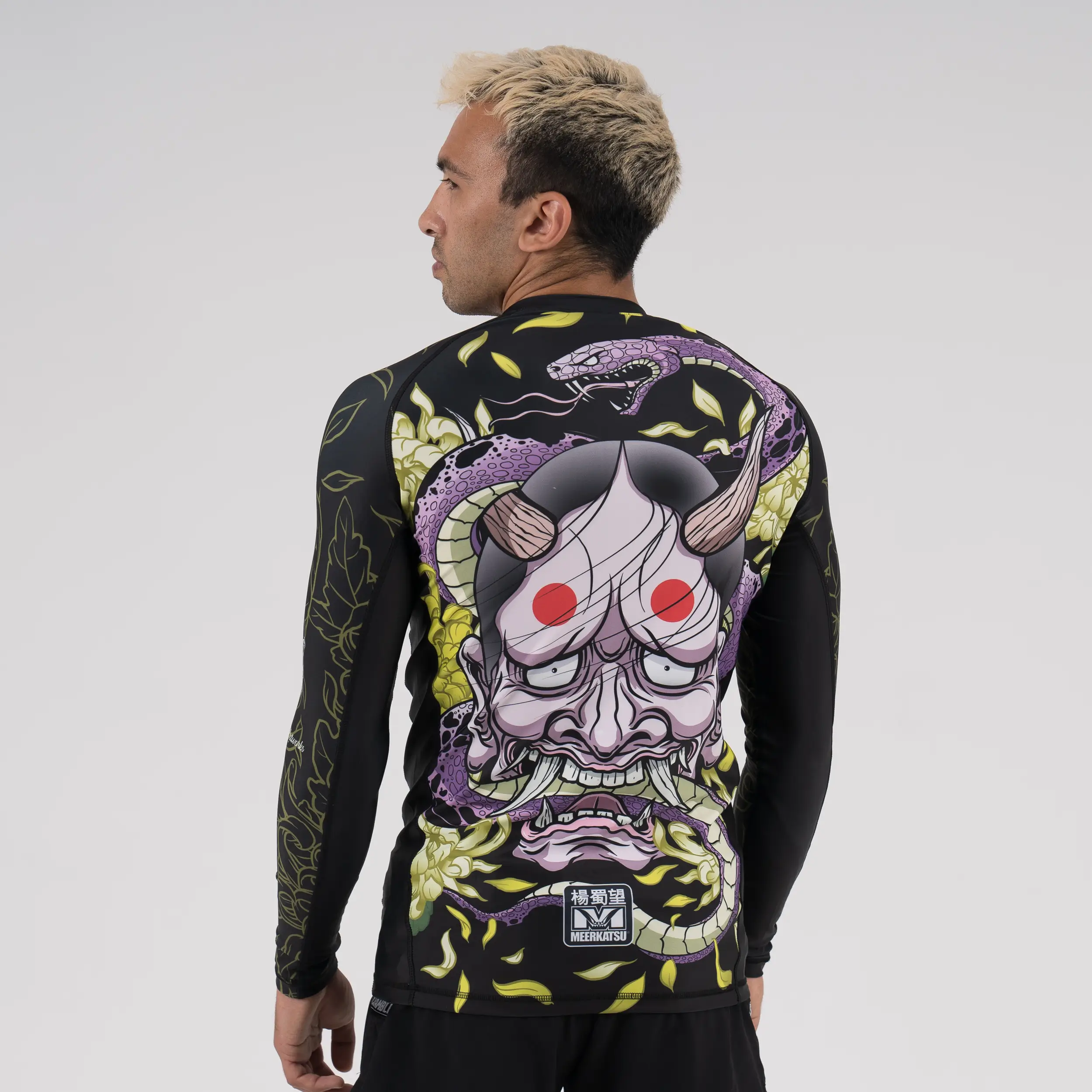 Man wearing Meerkatsu The Laughing Hannya Long Sleeve Rashguard