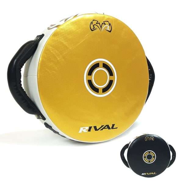 Person training with the Rival RPS7 Fitness Plus Punch Shield in a fitness studio.