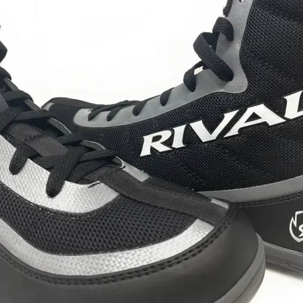 Rival Rsx Prospect Boxing Boots Black Grey 3 Girl wearing Rival RSX-Future Kids Boxing Boots in a boxing ring