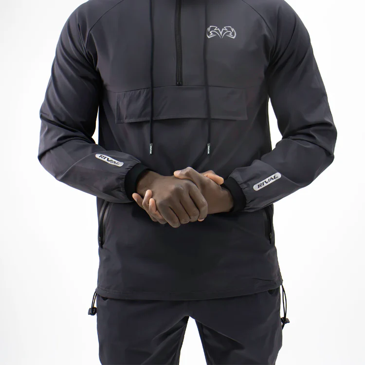 Man wearing a Rival Track Jacket with hood