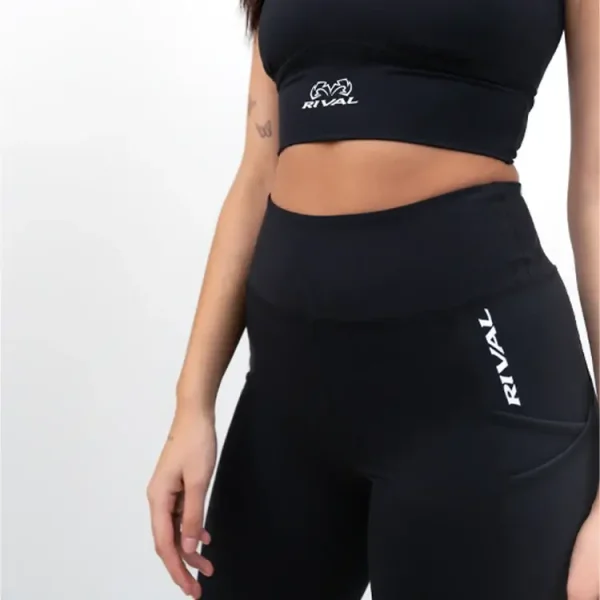 Rival Womens High Rise Leggings With Pockets Black 2 Woman posing in Rival Women's High-Rise Leggings with Pockets