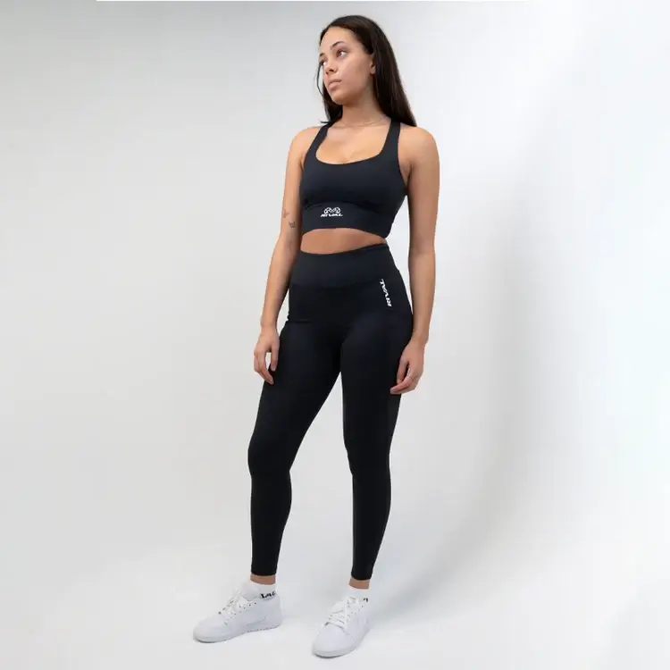 Woman wearing Rival Women's High-Rise Leggings with pockets