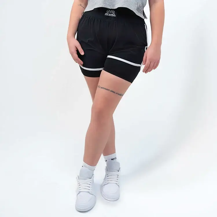 Woman wearing Rival Women's Shorts with Compression Lining