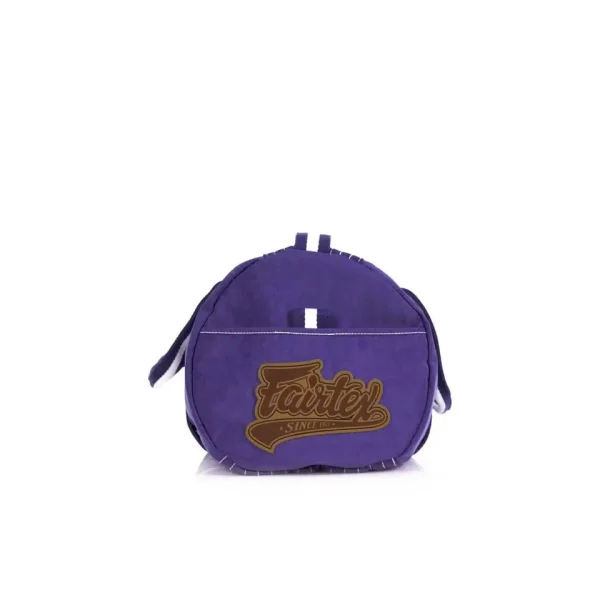 A Fairtex retro style barrel bag in a posed setting