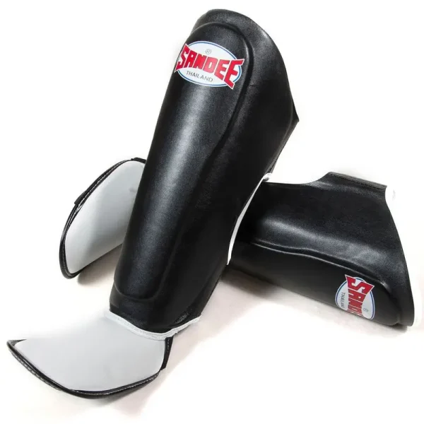 Sandee Kids Authentic Boot Shinguards Black White 3 Kid wearing Sandee Kids Authentic Boot Shinguards