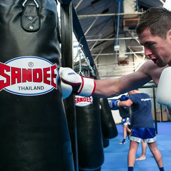 Sandee Punch Bag Full Leather Black 1 Sandee Full Leather Punch Bag gleaming under studio lights