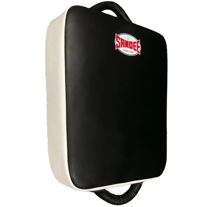 A Sandee Suitcase Low Kick Pad utilized in martial arts training