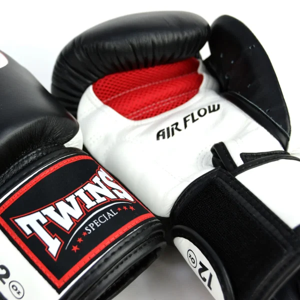 Twins Special Air Flow Boxing Gloves Bgvla2 2t Black White 1 A pair of Twins Special Air Flow Boxing Gloves BGVLA2-2T in action