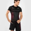 Man wearing Venum x UFC Performance Institute 2.0 Men's Short Sleeve Rashguard