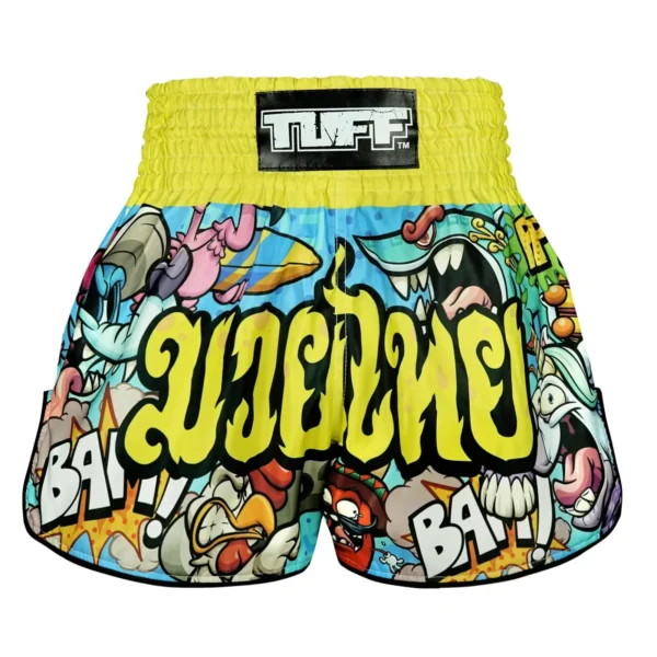 A young athlete wearing TUFF Kids Muay Thai Shorts Ready To Rumble RMS106