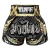 TUFF_MS631_KingOfNaga_MuayThaiShorts Pair of TUFF Muay Thai Shorts King of Naga MS631 in a dynamic position