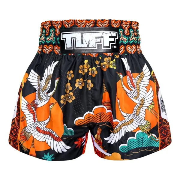 A person wearing TUFF Muay Thai Shorts Autumn Sunray MS652