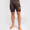 Man wearing Venum x UFC Fusion Fight Week Men’s Vale Tudo Compression Shorts