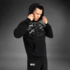 VenumUFCFusionPulloverHoodie Venum x UFC Fusion Replica Men's Pullover Hoodie in black color.