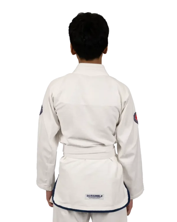Kid wearing Scramble Athlete BJJ Gi