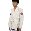 Kid wearing Scramble Athlete BJJ Gi outfit