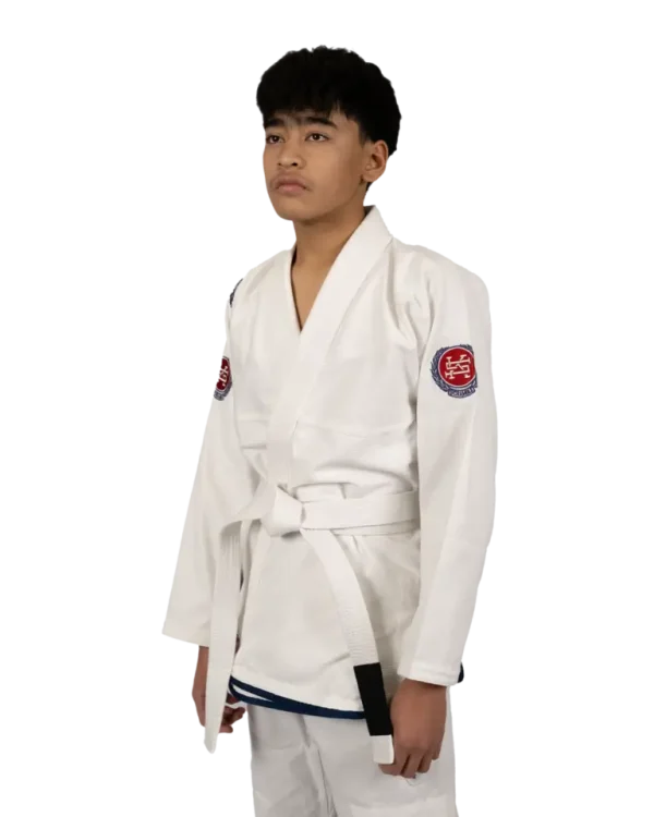 Kid wearing Scramble Athlete BJJ Gi outfit