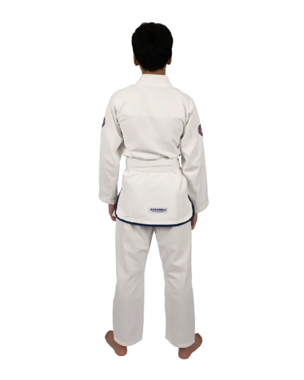 A child wearing a Scramble Athlete BJJ Gi