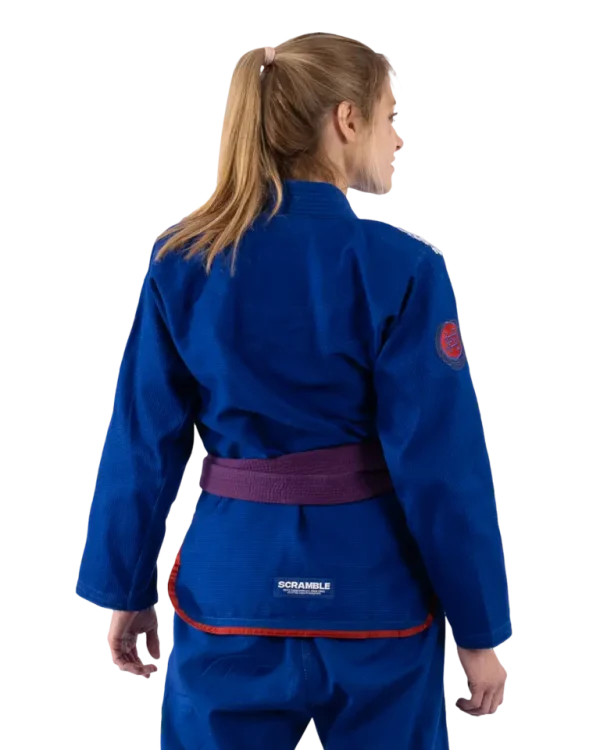 Scramble Athlete Bjj Gi Womens Blue 1 Woman wearing Scramble Athlete BJJ Gi