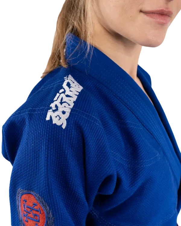 Scramble Athlete Bjj Gi Womens Blue 5 Woman wearing Scramble Athlete BJJ Gi
