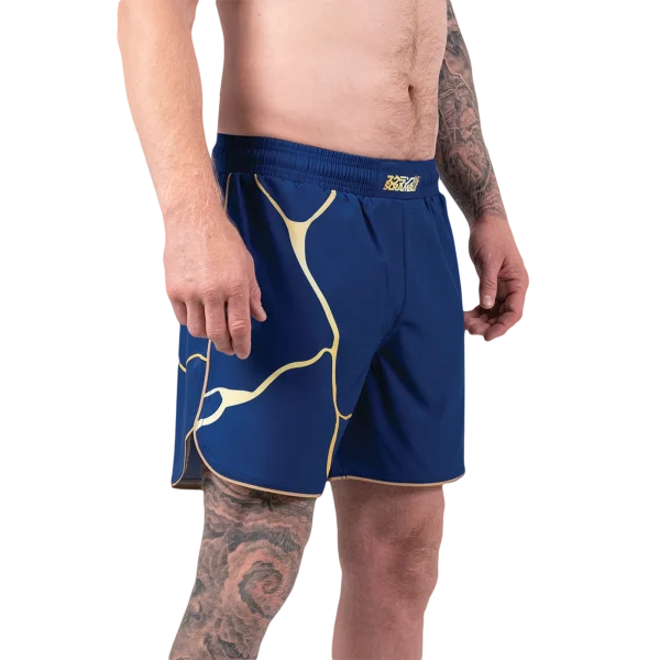 Yellow shorts with a kintsugi-style design