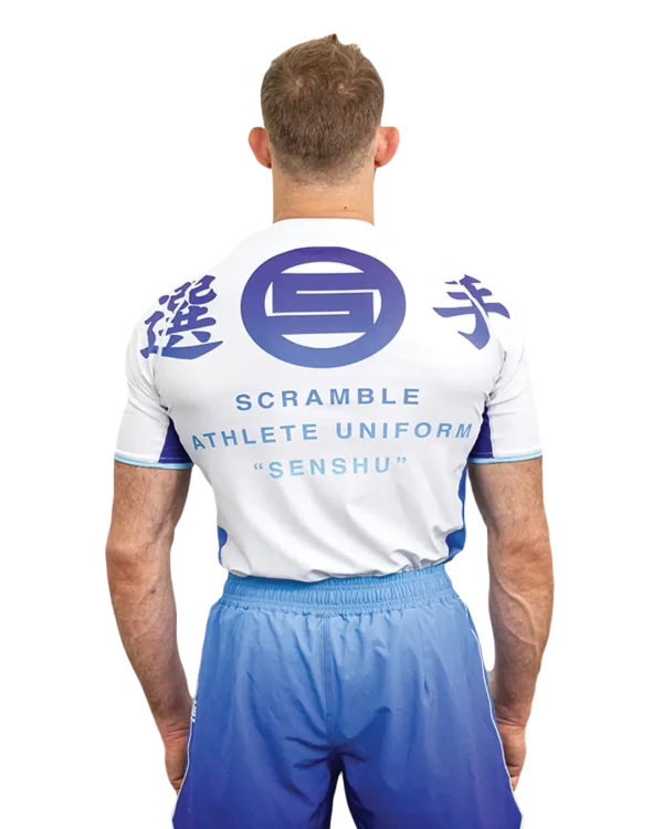 Man wearing Scramble Senshu '25 Rashguard