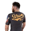 Man wearing Scramble Viking Rashguard with intricate Norse designs