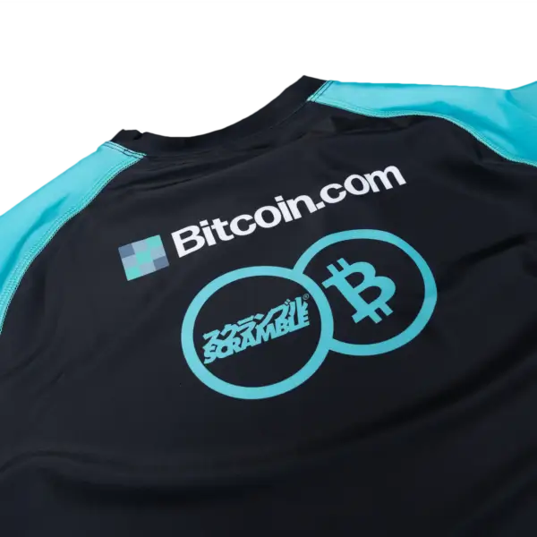 A model showcasing the Scramble x Bitcoin.com Rashguard