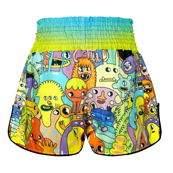 Tuff Kids Muay Thai Shorts We Come In Peace Rms107 Multi Coloured 2 Kid wearing TUFF Kids Muay Thai Shorts, We Come In Peace model RMS107.