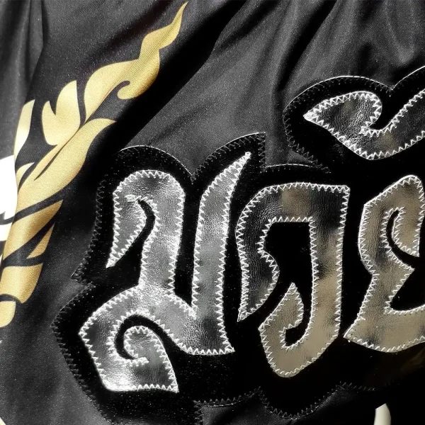 Tuff Muay Thai Shorts King Of Naga Ms631 Black Gold 4 TUFF Muay Thai Shorts King of Naga MS631 in vibrant colors