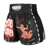 Muay Thai shorts featuring Hanuman flying raising the flag design