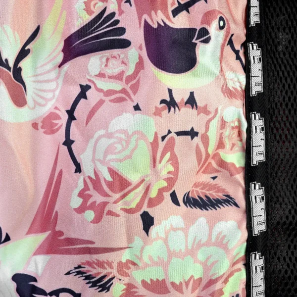 Tuff Retro Muay Thai Shorts Birds With Roses Msc123 Pink 4 Man wearing TUFF Retro Muay Thai Shorts with bird and rose design