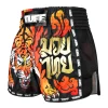 Tuff Retro Muay Thai Shorts Furious Tiger Black 1 Man wearing TUFF Retro Muay Thai Shorts with Furious Tiger design
