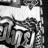 Black and white TUFF Retro Muay Thai Shorts with The Great Hongsa design