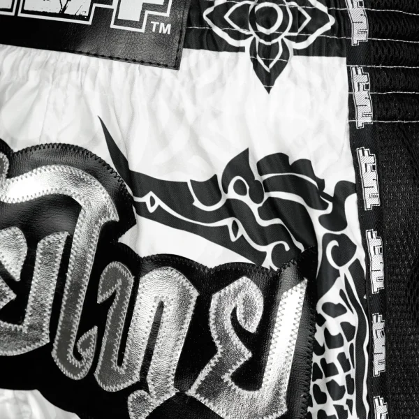 Black and white TUFF Retro Muay Thai Shorts with The Great Hongsa design