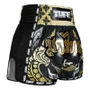 Man wearing TUFF Retro Muay Thai Shorts The King Of Naga MSC107