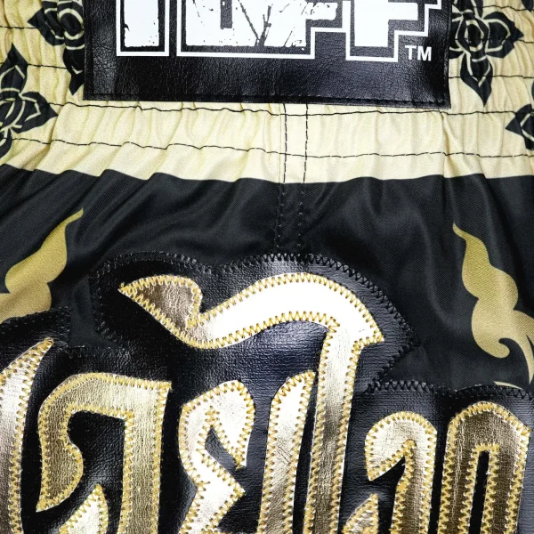 Man wearing TUFF Retro Muay Thai Shorts The King Of Naga MSC107