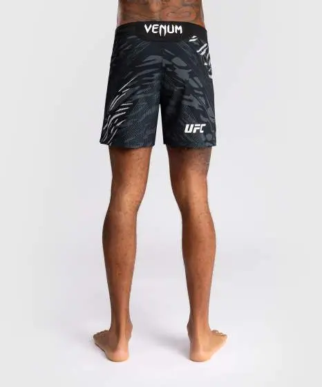 Venum x UFC Fusion Authentic Fight Night Men's Fight Shorts - Short Fit in striking color.