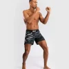 Venum x UFC Fusion Authentic Fight Night Men's Fight Shorts - Short Fit displayed on a minimalistic background.