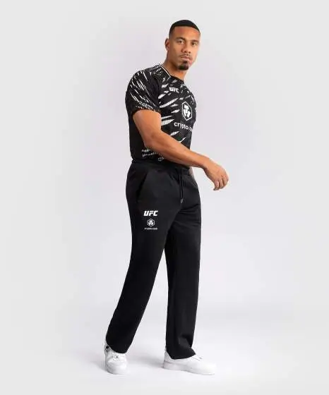 Man wearing Venum x UFC Fusion Authentic Fight Night Men's Straight Leg Walkout Jogger Pants