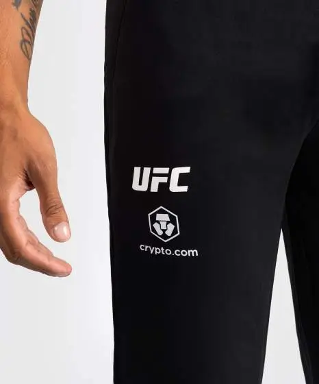 Man wearing Venum x UFC Fusion Authentic Fight Night Men's Straight Leg Walkout Jogger Pants