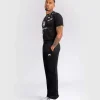 Man modeling Venum x UFC Fusion Authentic Fight Night Men's Straight Leg Walkout Jogger Pants.
