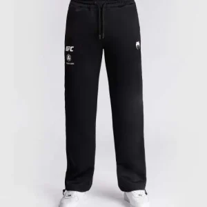 Man wearing Venum x UFC Fusion Authentic Fight Night Men's Straight Leg Walkout Jogger Pants