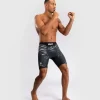 Man wearing Venum x UFC Fusion Authentic Fight Night Men's Vale Tudo Compression Shorts