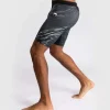 Man wearing Venum x UFC Fusion Authentic Fight Night Men's Vale Tudo Compression Shorts