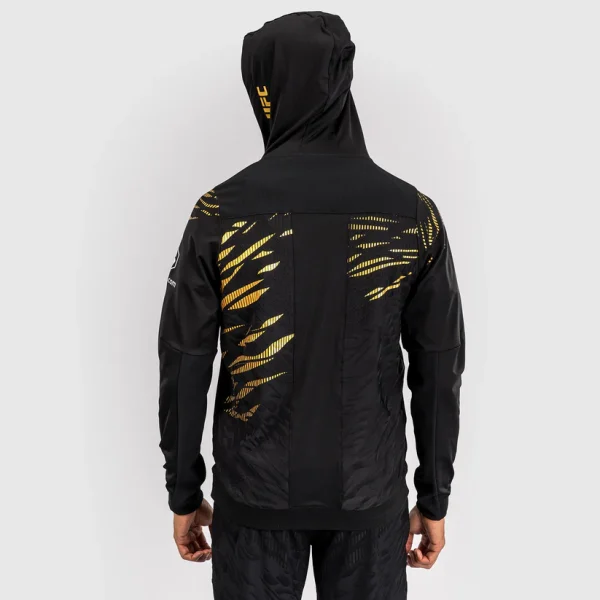 Man wearing Venum x UFC Fusion Authentic Fight Night Men's Walkout Hoodie